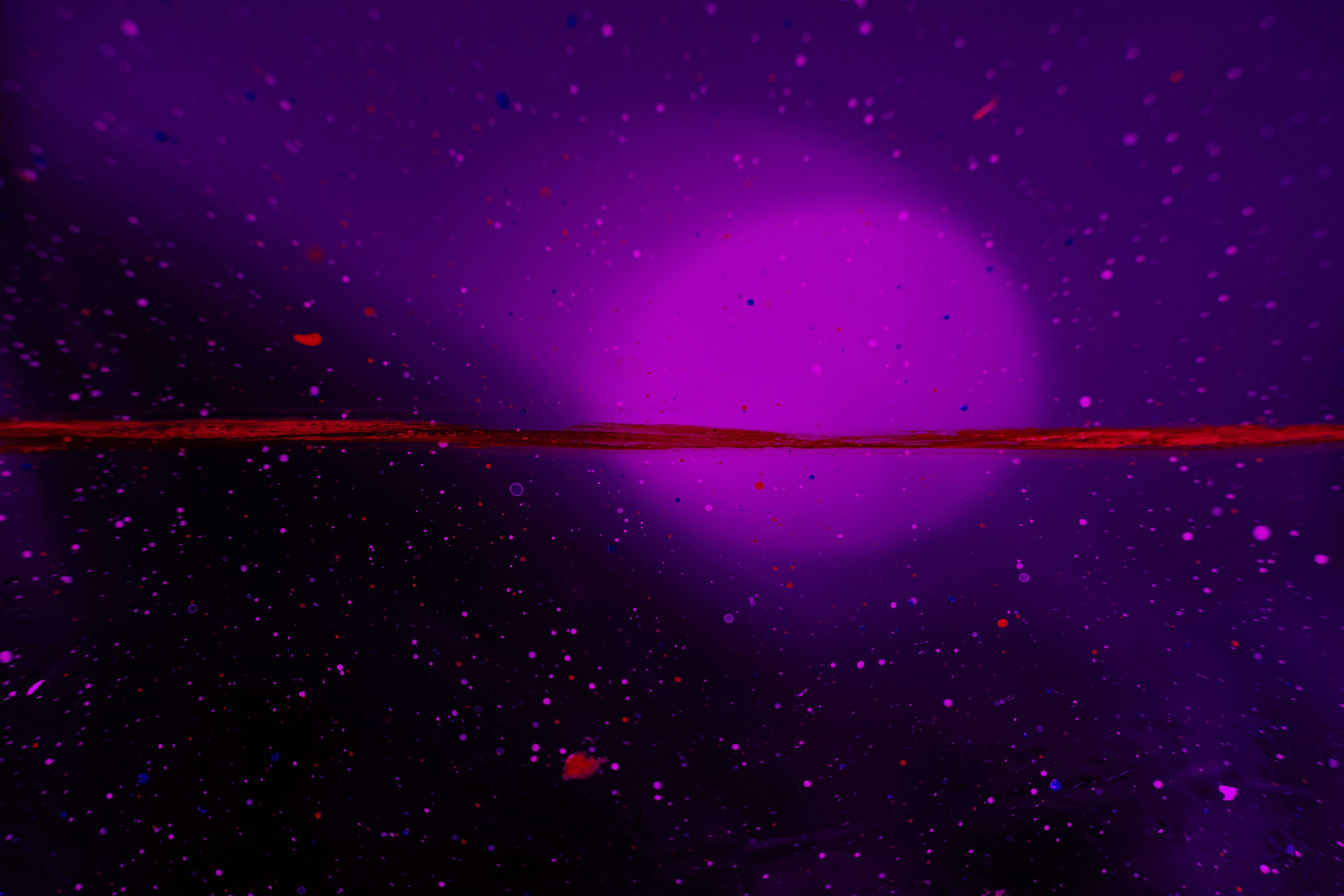 Purple mark on a space dust background